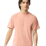 Comfort Colors 1717 heavyweight T-shirt in Peachy, shown on a model from the front.