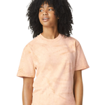 womens peach short sleeve t shirt with relaxed fit and soft washed texture styled with light blue jeans for a casual look