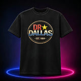 Black Comfort Colors 1717 T-shirt featuring the distressed Dr. Dallas Est. 1984 logo, front view