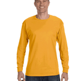 Man wearing a Gildan Heavy Cotton Long Sleeve T-shirt in Gold.