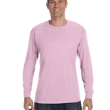 Man wearing a Gildan Heavy Cotton Long Sleeve T-shirt in Light Pink.