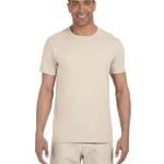 Man wearing a Gildan SoftStyle T-shirt in "Natural" color, standing with a relaxed posture and smiling.