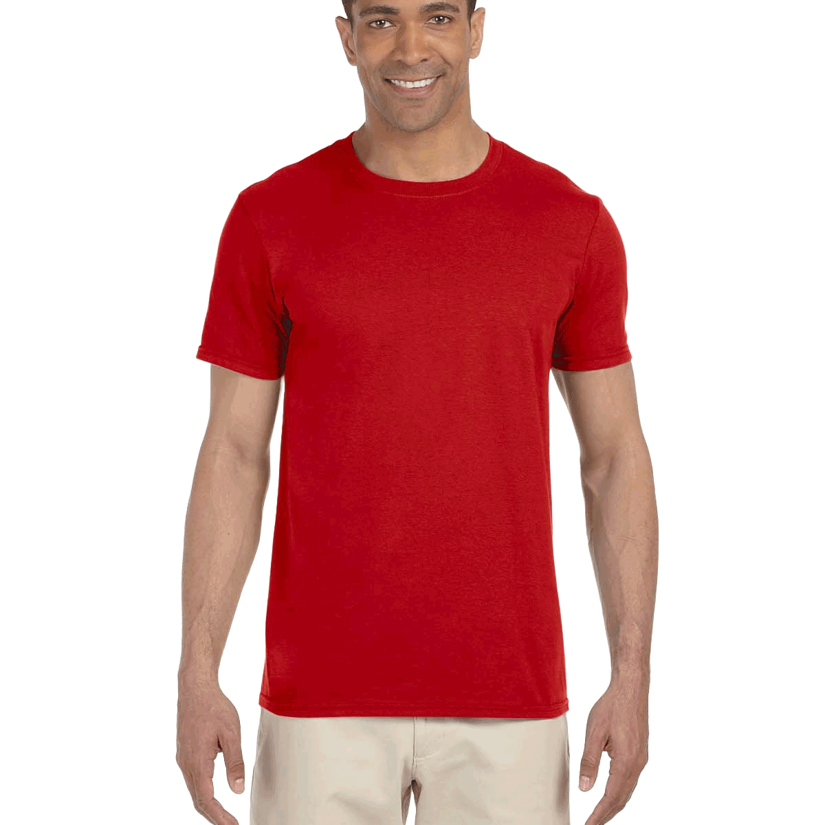 Man wearing a Gildan SoftStyle T-shirt in "Red" color, standing with a relaxed posture and smiling.