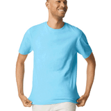 Man wearing a Gildan SoftStyle T-shirt in "Sky" color, standing with a relaxed posture and smiling while holding the hem of his shirt.