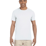 Man in a "White" colored Gildan SoftStyle T-shirt, standing with a relaxed posture and a friendly smile.