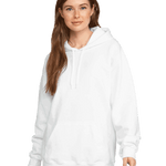 Front view of a woman wearing a Gildan Adult Softstyle Fleece Pullover Hoodie in White color, standing with a neutral expression and hands relaxed by her sides