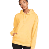 Front view of a woman wearing a Gildan Adult Softstyle Fleece Pullover Hoodie in Yellow Haze color, standing with a neutral expression