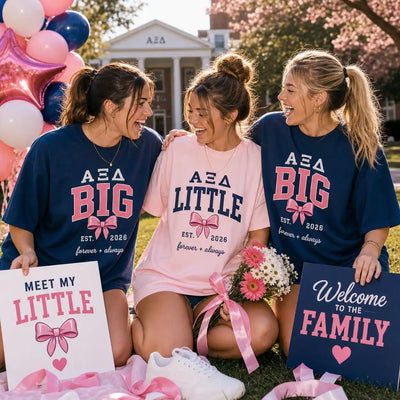 Alpha Sigma Delta big and little reveal shirts with welcome signs and balloons