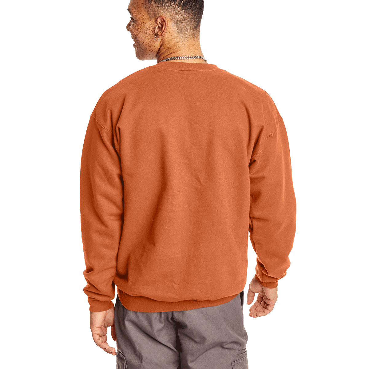 Rear view of a man wearing a Hanes Adult Ultimate Cotton 90/10 Fleece Crew in Pumpkin.