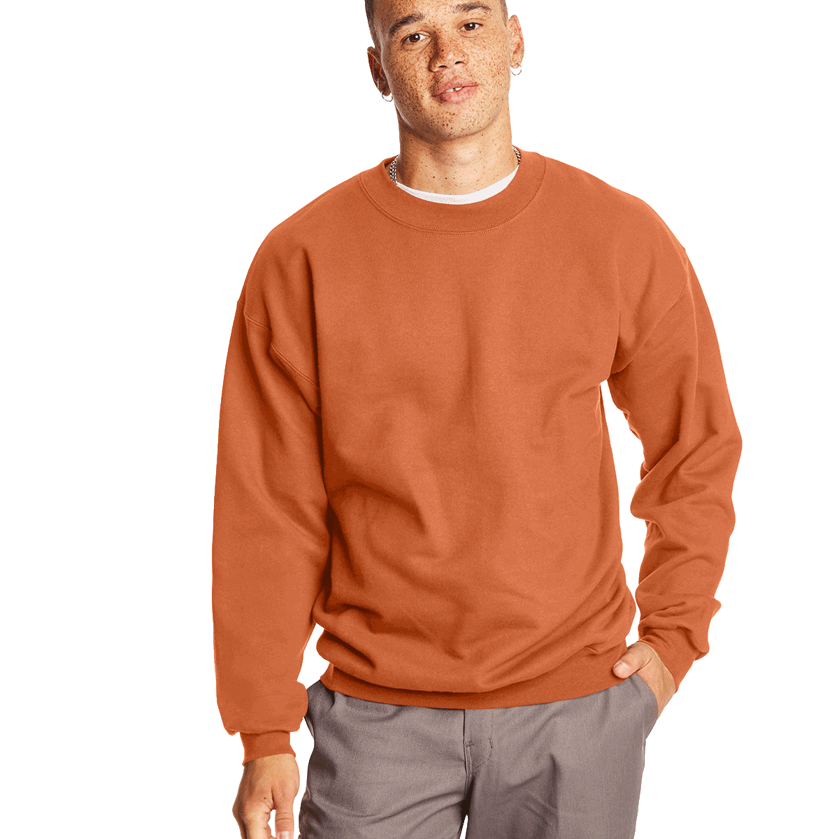 Man wearing a Hanes Adult Ultimate Cotton 90/10 Fleece Crew in Pumpkin.