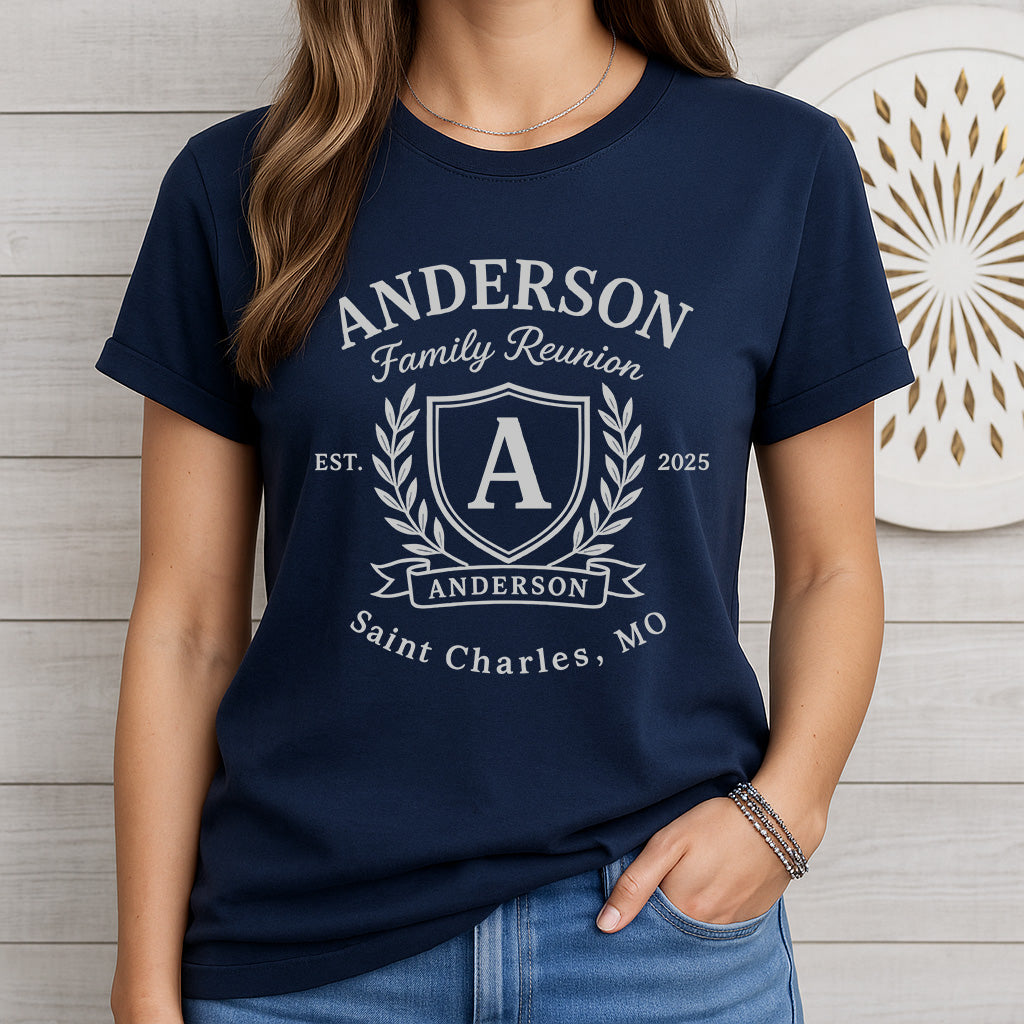 Woman wearing navy “Anderson Family Reunion” T-shirt with crest, “Est. 2025” and “Saint Charles, MO” for custom reunion apparel and event merchandise.