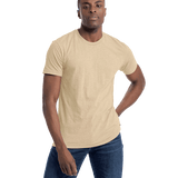 Next Level Apparel Unisex CVC Crewneck T-Shirt in cream color worn by a man, standing casually with a neutral expression.