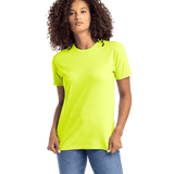 Woman wearing a Next Level Apparel Unisex CVC Crewneck T-Shirt in "Neon Yellow" color, standing with a neutral expression and hands relaxed by her sides.