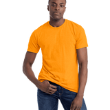 Next Level Apparel Unisex CVC Crewneck T-Shirt in orange color worn by a man, standing casually with a neutral expression.