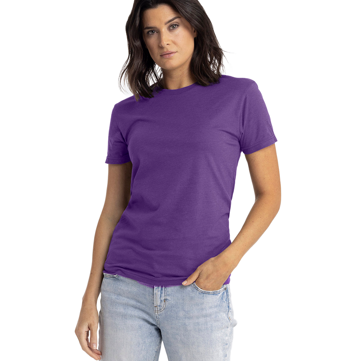 Next Level Apparel Unisex CVC Crewneck T-Shirt in "Purple Rush" color worn by a woman, standing casually with a neutral expression and one hand in her pocket.