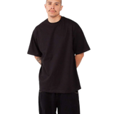 Shaka Wear SHMHSS black oversized heavyweight T-shirt on model, front view
