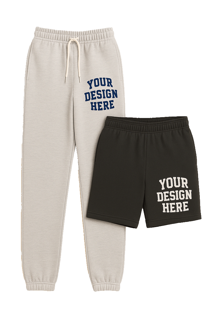 High-resolution transparent PNG mockup of cream jogger sweatpants and black athletic shorts with customizable “Your Design Here” side prints.