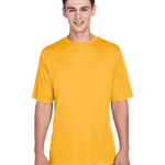 Team 365 Men's Zone Performance T-Shirt in "Sport Athletic Gold" color worn by a smiling boy, standing casually.