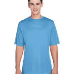 Team 365 Men's Zone Performance T-Shirt in "Sport Light Blue" color worn by a smiling boy, standing casually.