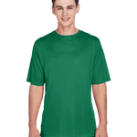 Boy in a "Sport Kelly" Team 365 Men's Zone Performance T-Shirt, standing with a relaxed posture and a cheerful expression.