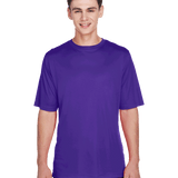 Boy in a "Sport Purple" Team 365 Men's Zone Performance T-Shirt, standing with a relaxed posture and a cheerful expression.