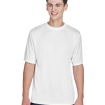 Boy in a "White" Team 365 Men's Zone Performance T-Shirt, standing with a relaxed posture and a cheerful expression.