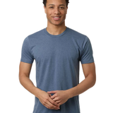 Tultex 202 T-shirt in Heather Indigo Blue, shown on a model from the front.
