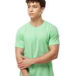 Tultex 202 T-shirt in Heather Neo Mint, shown on a model from the front.