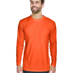 Man wearing an UltraClub Adult Cool & Dry Performance Sport Long-Sleeve T-Shirt in Bright Orange.