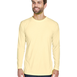 Man wearing an UltraClub Adult Cool & Dry Performance Sport Long-Sleeve T-Shirt in Butter.