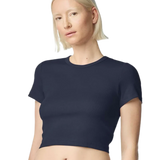 Model wearing Navy American Apparel Women's Baby Rib Cropped Tee, front view